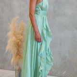 Vestido maxi con escote halter y volantes de caída fluida