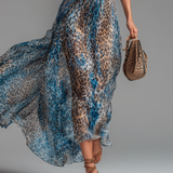Wild - Long chiffon dress with leopard print and bare shoulders