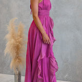 Vestido maxi con escote halter y volantes de caída fluida