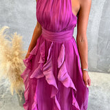 Vestido maxi con escote halter y volantes de caída fluida